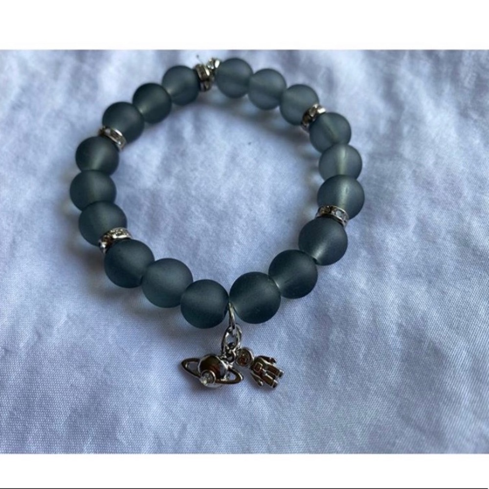 Beads bracelet with some cute charms👨🏻‍🚀🤍❕